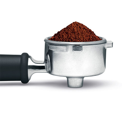 Image of a filled portafilter using the sage dose control pro grinder.